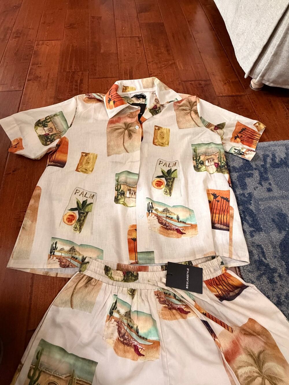 Beulah Short sleeved button down short set. Featuring a postcard themed print.